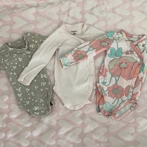 3 Carter’s onesies
